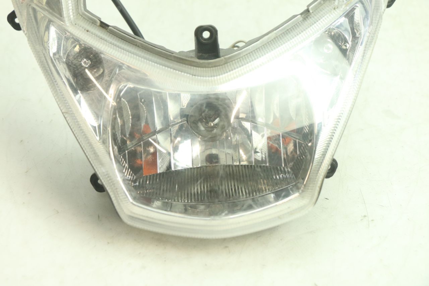 photo de FAROL DIANTEIRO PEUGEOT KISBEE 4T 50 (2018 - 2022) - Zoom do estado de desgaste