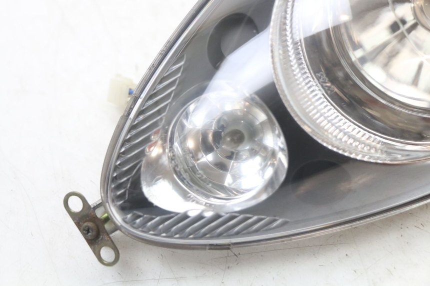 photo de FAROL DIANTEIRO SYM MIO 50 (2011 - 2017) - Detalhe da peça
