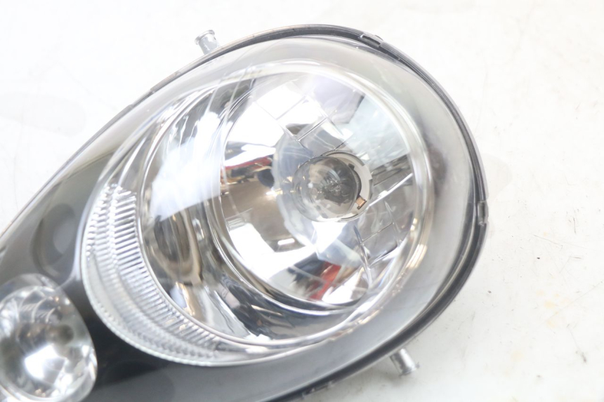 photo de FAROL DIANTEIRO SYM MIO 50 (2011 - 2017) - Zoom do estado de desgaste
