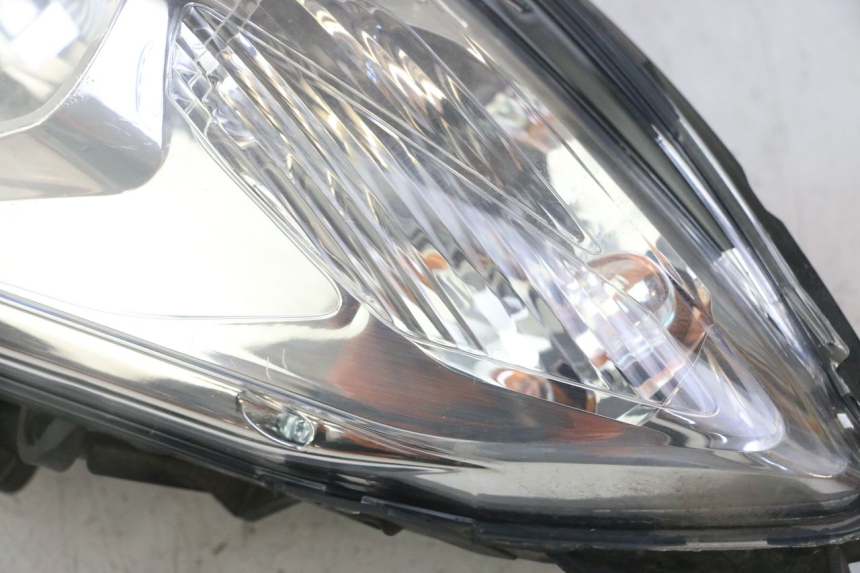 photo de FAROL DIANTEIRO PEUGEOT SATELIS 125 (2013 - 2018) - Estado da superfície