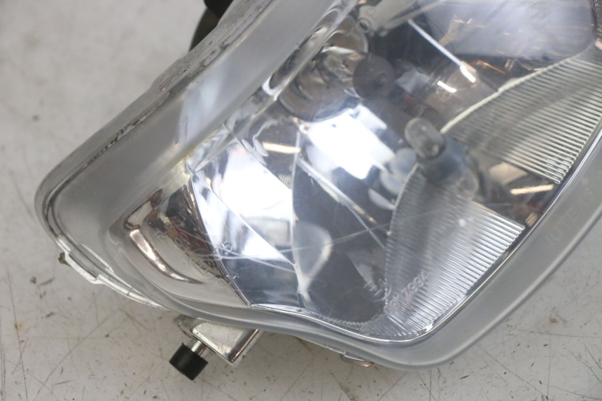photo de FAROL DIANTEIRO PEUGEOT TWEET 4T 50 (2014 - 2019) - Zoom do estado de desgaste