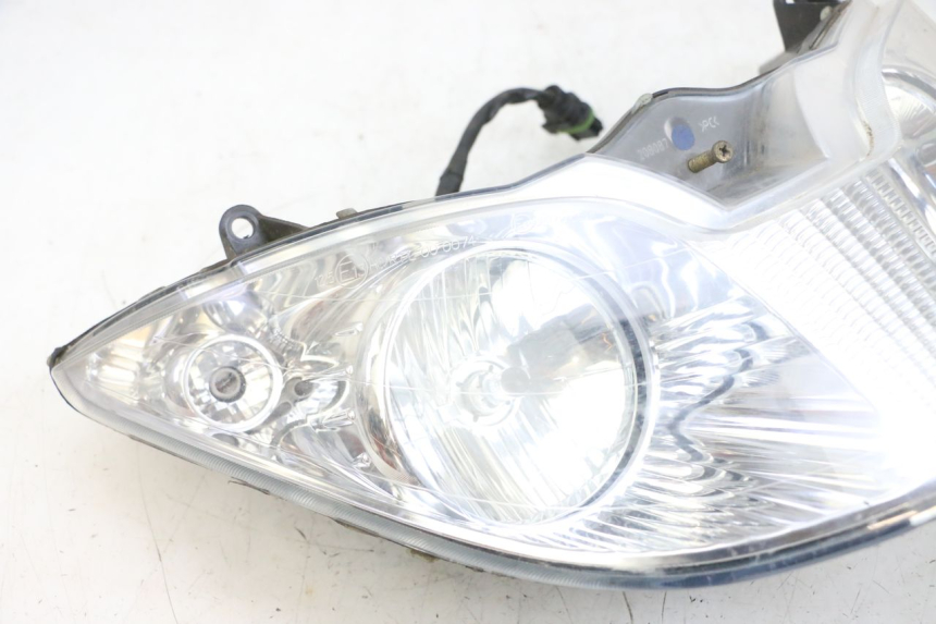 photo de FAROL DIANTEIRO PIAGGIO X8 125 (2004 - 2007) - Detalhe da peça