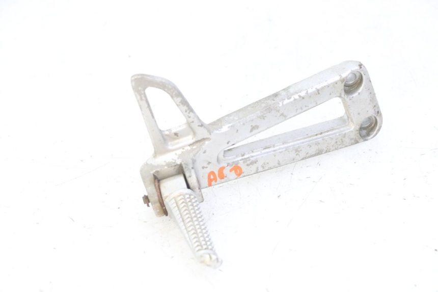 photo de SUPORTE DO DESCANSO DE PÉ TRASEIRO DIREITO YAMAHA TDR DELTABOX 125 (1997 - 2003) - Estado da superfície