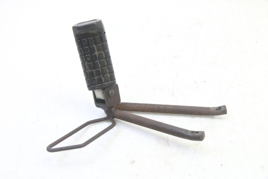 photo de SUPORTE DO DESCANSO DE PÉ TRASEIRO ESQUERDO APRILIA ETX 125 (1998 - 2002) - Detalhe da peça