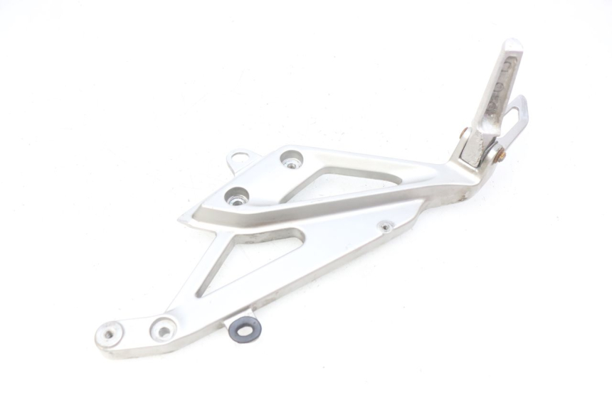 photo de SUPORTE DO DESCANSO DE PÉ TRASEIRO ESQUERDO HONDA INTEGRA NC D 750 (2016 - 2018) - Peça verificada