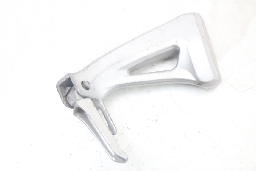 photo de SUPORTE DO DESCANSO DE PÉ TRASEIRO ESQUERDO SUZUKI SV N 650 (1999 - 2002) - Outro ângulo de visão