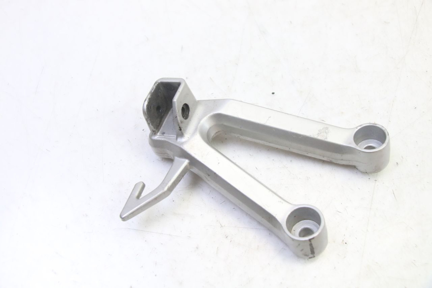 photo de SUPORTE DO DESCANSO DE PÉ TRASEIRO ESQUERDO SUZUKI SV S 650 (2003 - 2009) - Zoom do estado de desgaste