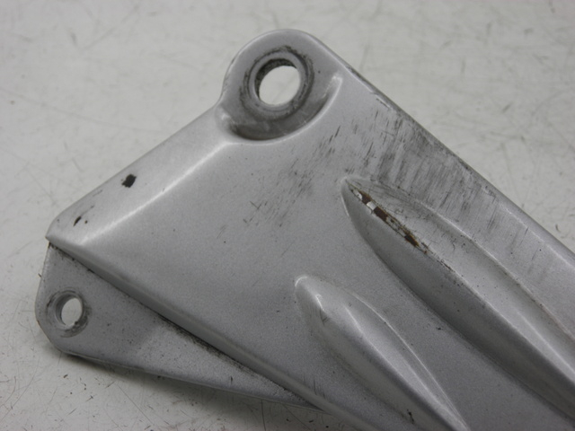 photo de SUPORTE DO DESCANSO DE PÉ TRASEIRO ESQUERDO YAMAHA YBR CUSTOM 125 (2008 - 2010) - Vista geral