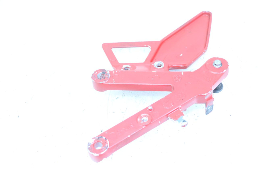 photo de SUPORTE DO DESCANSO DE PÉ DIANTEIRO DIREITO YAMAHA TZR 50 (2008 - 2016) - Outro ângulo de visão