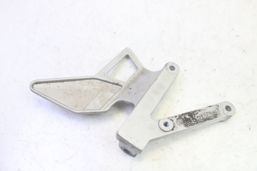 photo de SUPORTE DO DESCANSO DE PÉ DIANTEIRO ESQUERDO YAMAHA TZR 50 (2008 - 2016) - Zoom do estado de desgaste