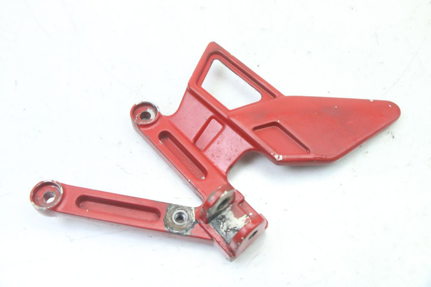 photo de SUPORTE DO DESCANSO DE PÉ DIANTEIRO ESQUERDO YAMAHA TZR 50 (2008 - 2016) - Vista principal