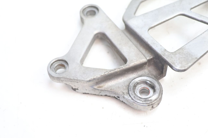 photo de SUPORTE DO DESCANSO DE PÉ DIANTEIRO ESQUERDO KAWASAKI ZX-6R ZX6R 600 (1995 - 1997) - Detalhe da peça