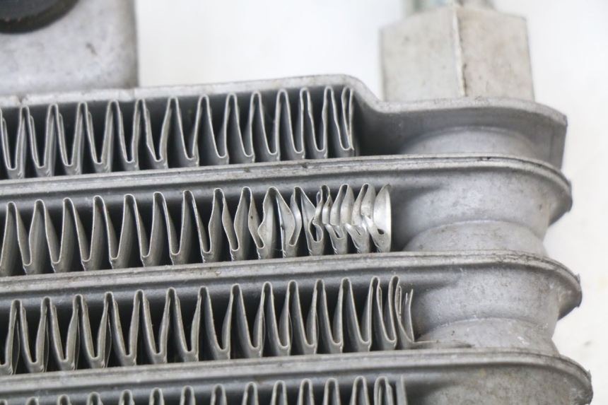 photo de RADIADOR DE ÓLEO HYOSUNG XRX 125 (2000 - 2008) - Ampliação técnica