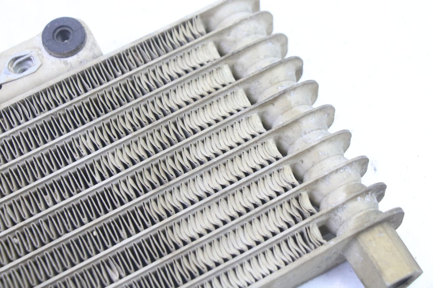 photo de RADIADOR DE ÓLEO YAMAHA YFM BRUIN 350 (2003 - 2009) - Estado da superfície