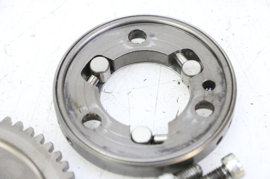 photo de ENGRENAGEM LIVRE DO MOTOR DE ARRANQUE KYMCO GRAND DINK 125 (2008 - 2014) - Estado da superfície